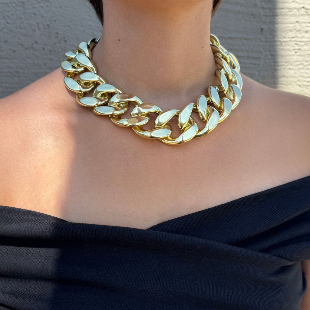 Massive Gold Curb Chain on Black Off-the-Shoulder Top Massive Gold Curb Chain on Black Off-the-Shoulder Top — Chunky Jewelry