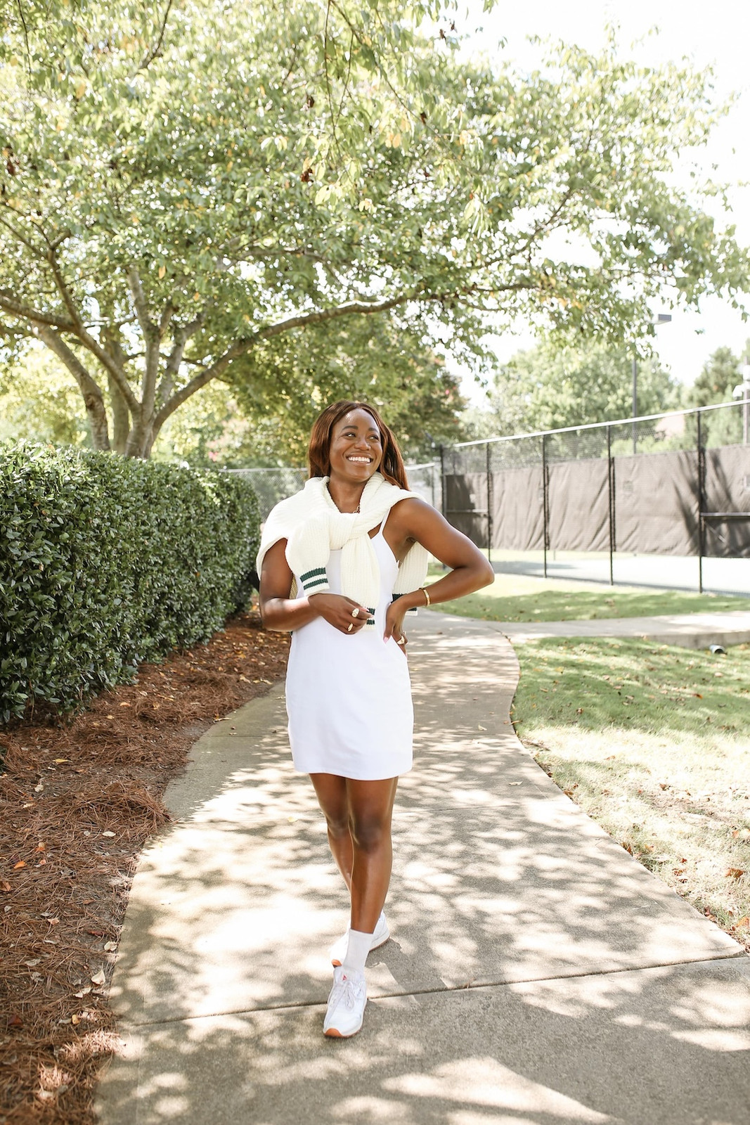 Clean White Athletic Dress with a Draped Knit Scarf for Sporty Sophistication — Tenniscore Outfits