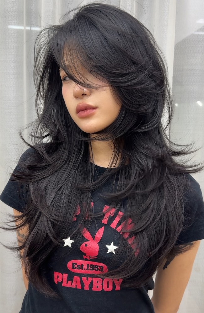 Jet Black Layered Wolf Cut With Wispy Bangs — Layered Hair