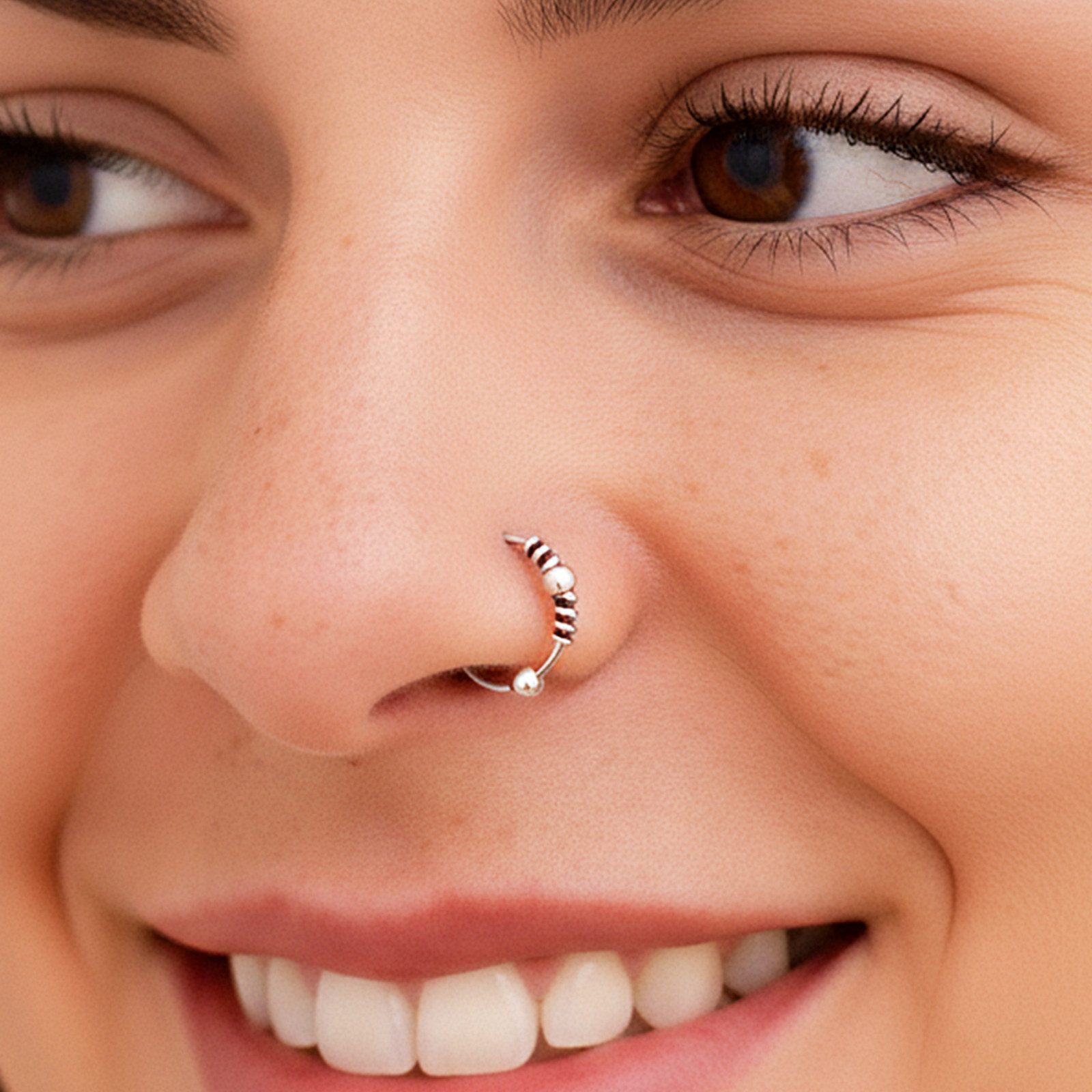 Silver Hoop with White Beads for a Detailed Nostril Accent Silver Hoop with White Beads for a Detailed Nostril Accent — Nose Piercing Ideas