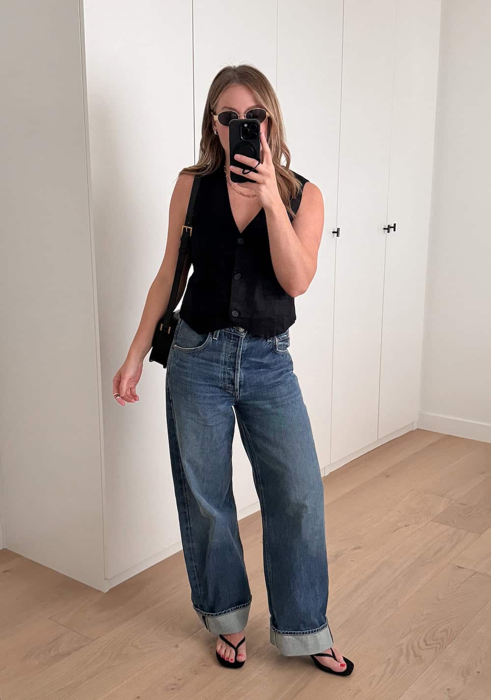 Blue Baggy Jeans with Rolled Cuffs and a Sleeveless Vest — Baggy Jeans Outfits