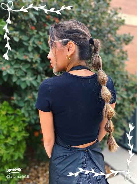 Ash Blonde Bubble Ponytail with Elongated Effect Ash Blonde Bubble Ponytail with Elongated Effect