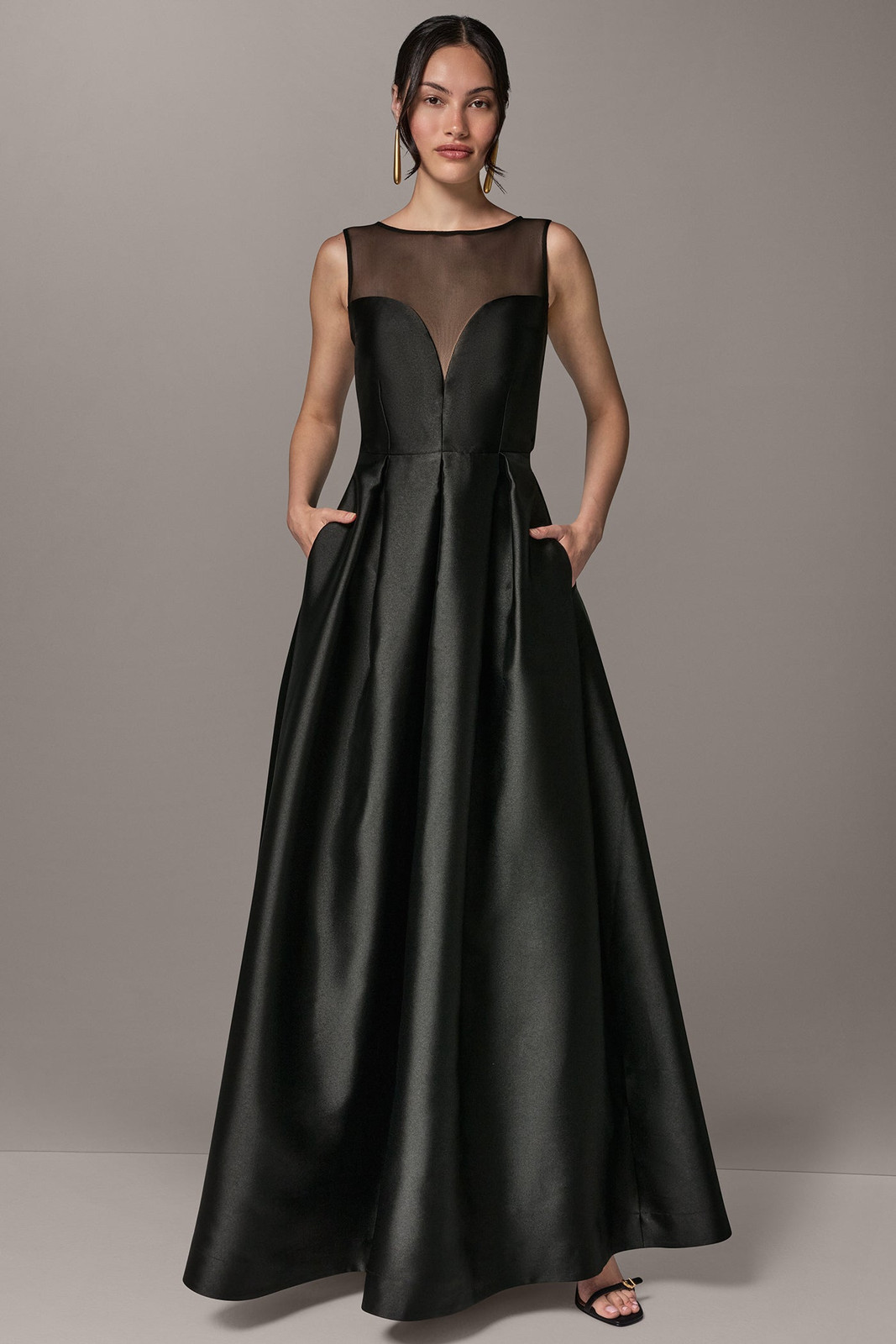 Sleek Black Ballgown with Sheer Illusion Neckline and Pockets — Black Tie Outfits