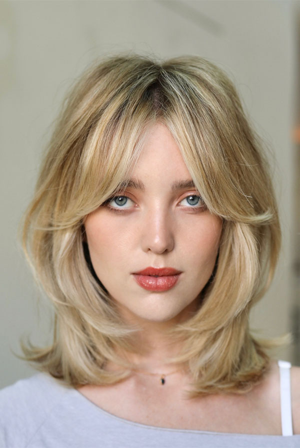 Blonde Butterfly With Blunt Bangs — Butterfly Haircut Medium Hair