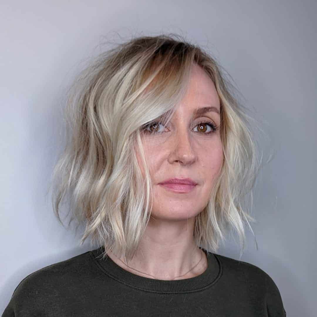 Ash Blonde Wavy Bob With Side Sweep Ash Blonde Wavy Bob With Side Sweep — Interview Hairstyles