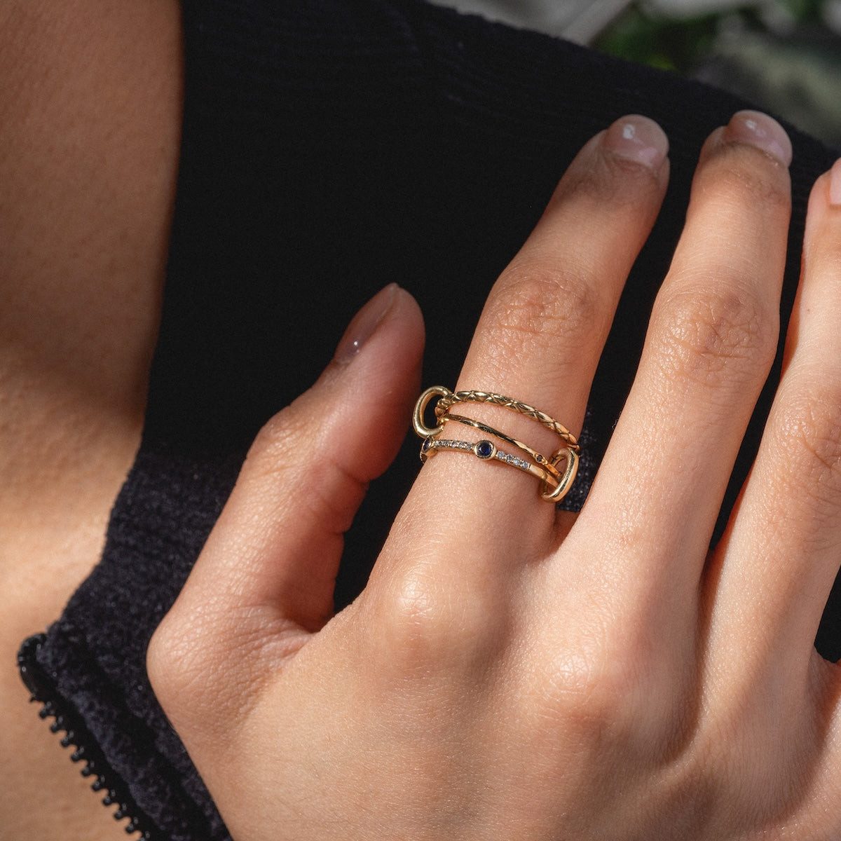 Gold Stack Featuring a Blue Stone Accent Gold Stack Featuring a Blue Stone Accent — Gold Ring Stack