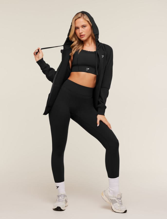 Layered Black Gym Outfit with Zip-Up Hoodie and White Sneakers — Gymshark Outfits