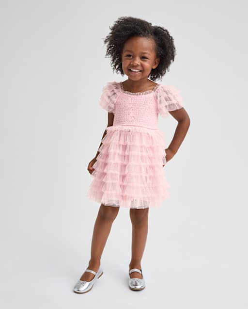 Light Pink Tulle Dress with Smocked Bodice and Ruffled Skirt Light Pink Tulle Dress with Smocked Bodice and Ruffled Skirt — Toddler Girl Outfits