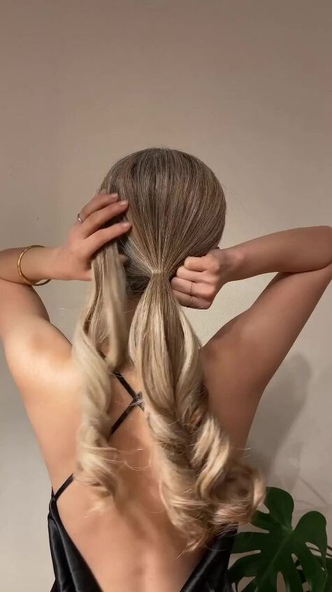 Ash Blonde Low Ponytail With Voluminous Curls