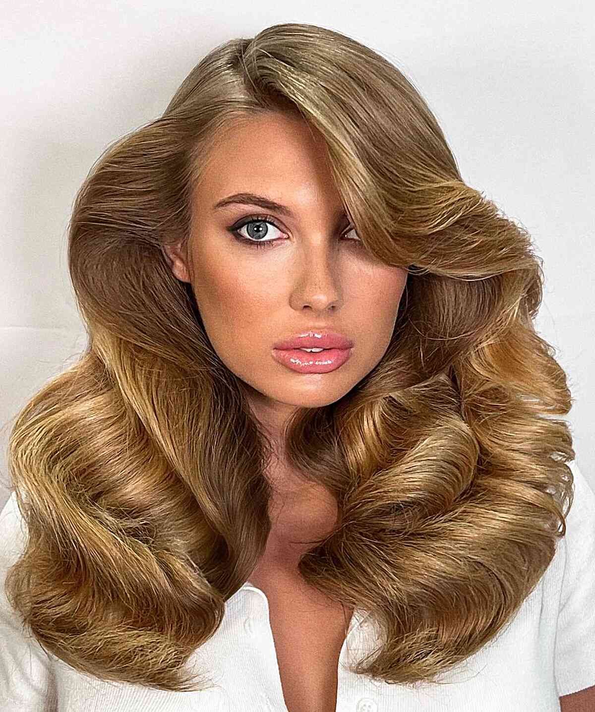 Golden Blonde Collarbone Blowout — 80s Hairstyles