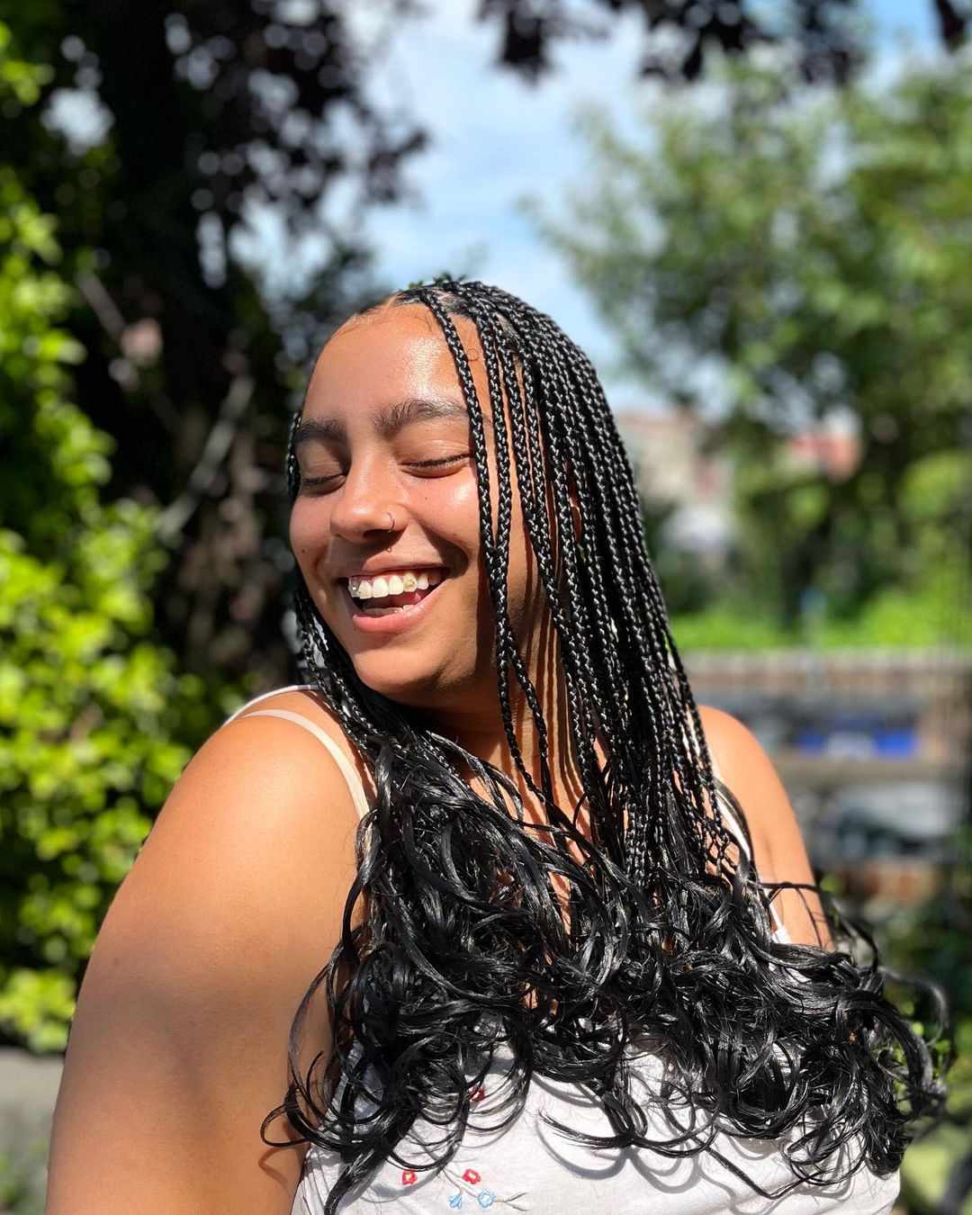 Solid Black Braids with Voluminous Curls Solid Black Braids with Voluminous Curls — French Curl Braids