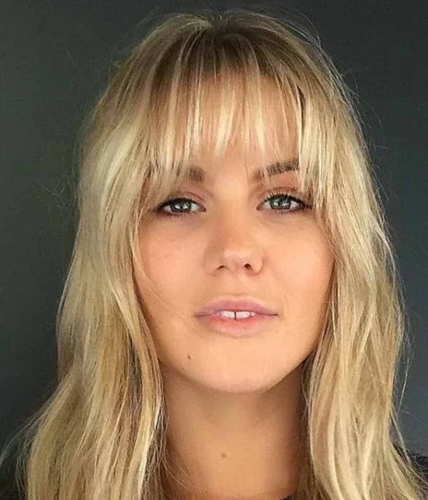 Black Top and Blonde Wispy Bangs