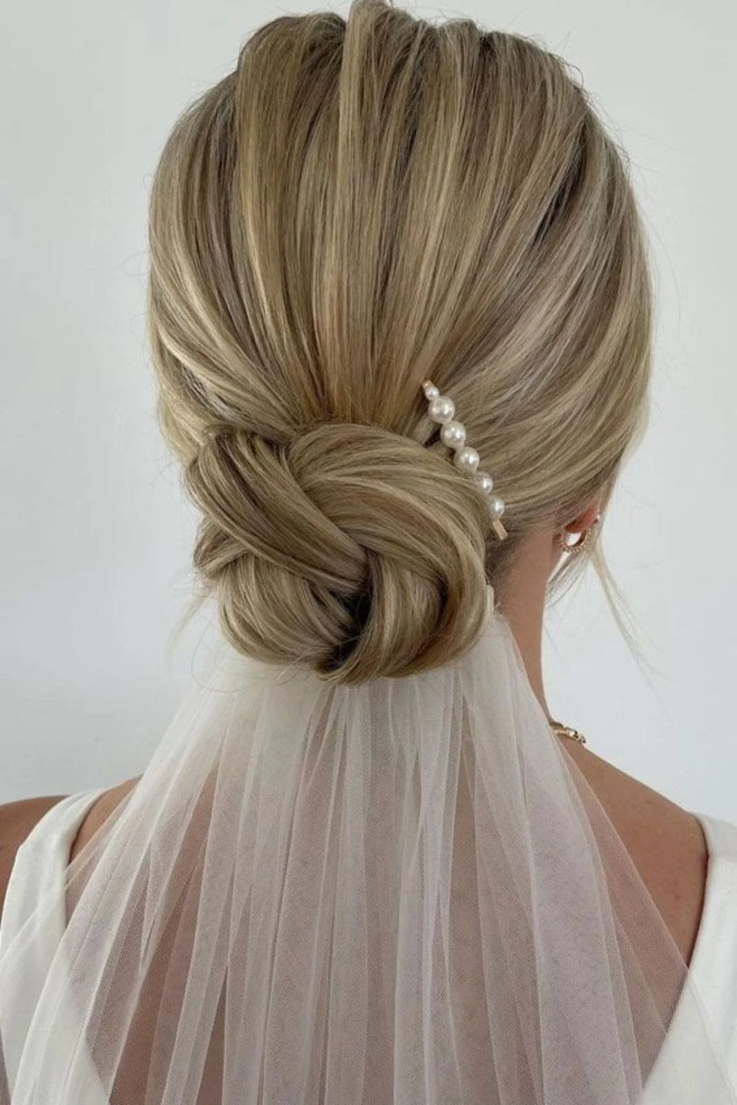 Braided Low Bun With Root Shadow Braided Low Bun With Root Shadow — Wedding Hairstyles for Thin Hair
