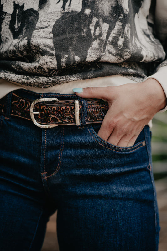 Graphic Sweatshirt and Denim Paired with an Ornate Tooled Leather Belt — Western Belt Outfits