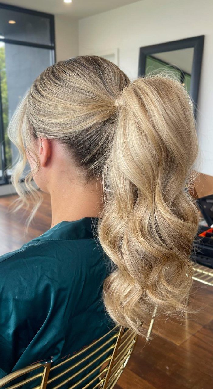 Voluminous Honey Blonde Curls Voluminous Honey Blonde Curls — Ponytail with Curtain Bangs
