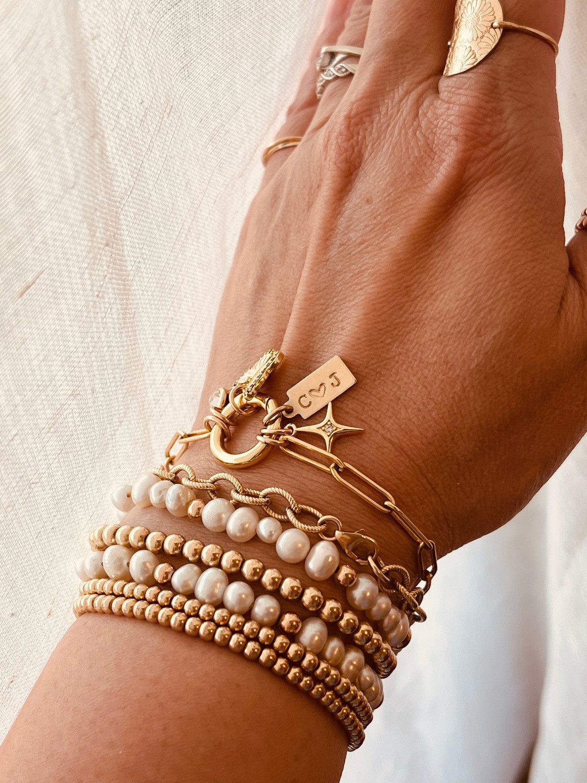 Mixed Media Bracelet Stack with Pearl and Star Charms Mixed Media Bracelet Stack with Pearl and Star Charms — Charm Bracelets
