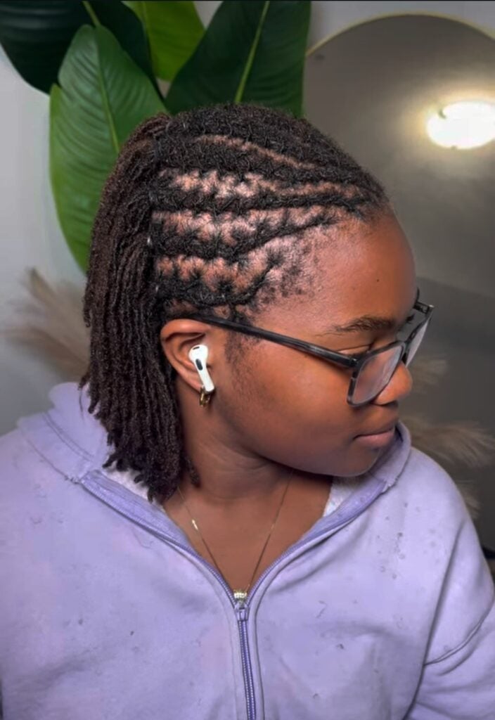 Locs Barrel Twists into a High Ponytail