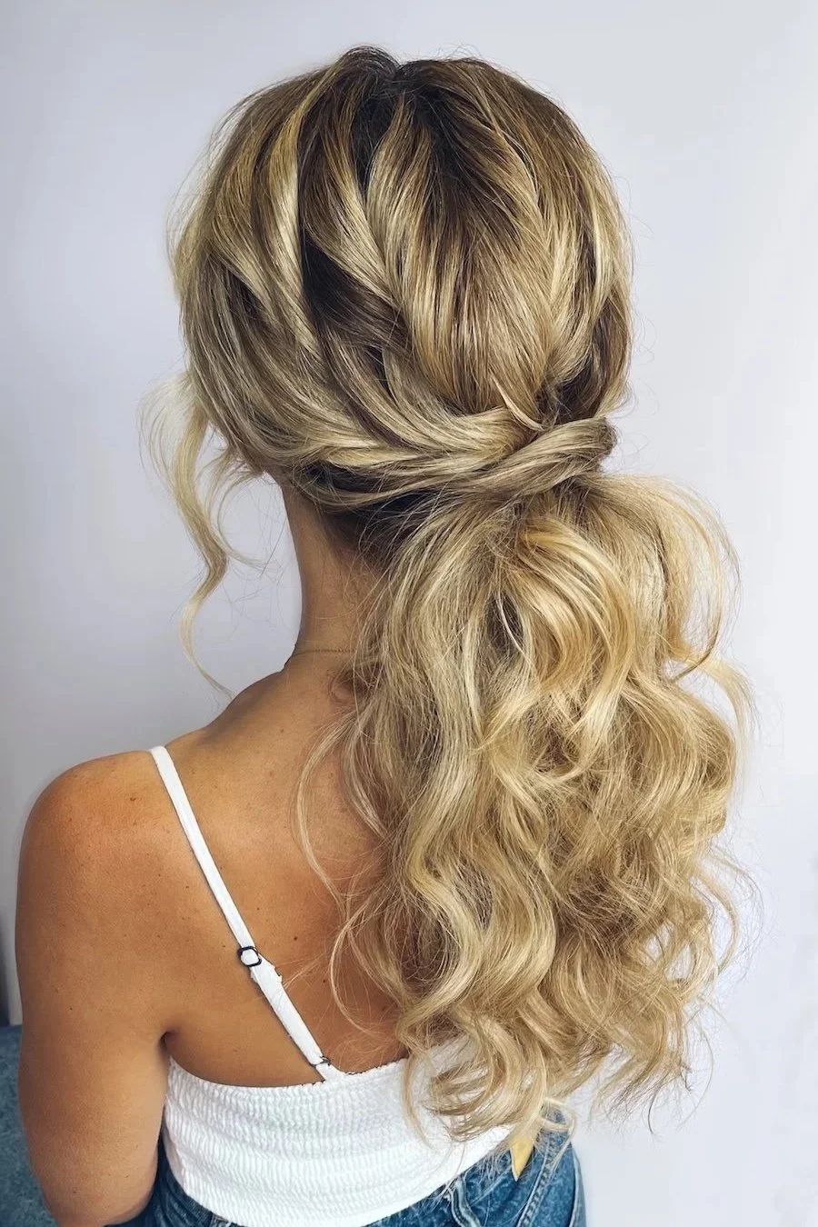 Low Ponytail With Braided Accents Low Ponytail With Braided Accents — Wedding Hairstyles for Curly Hair