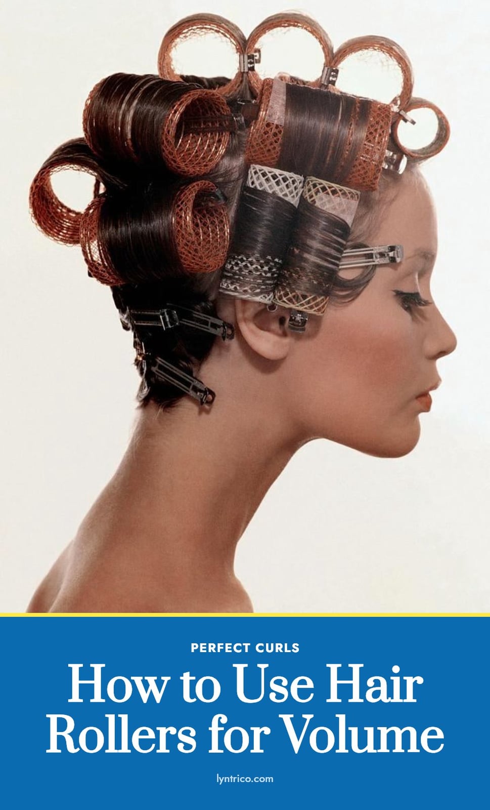 A woman's profile shows her dark hair styled in various large rollers and pins against a white background. Her makeup is dramatic.
