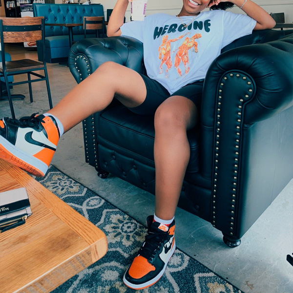 Vibrant Orange and Black Jordan High-Tops with Biker Shorts Vibrant Orange and Black Jordan High-Tops with Biker Shorts — Jordan Outfits
