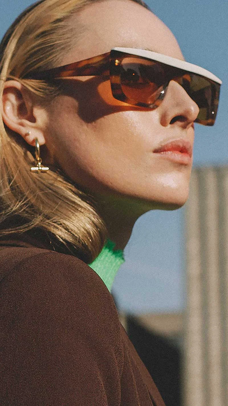 Brown Jacket Green Sweater Outfit Idea — Sunglasses