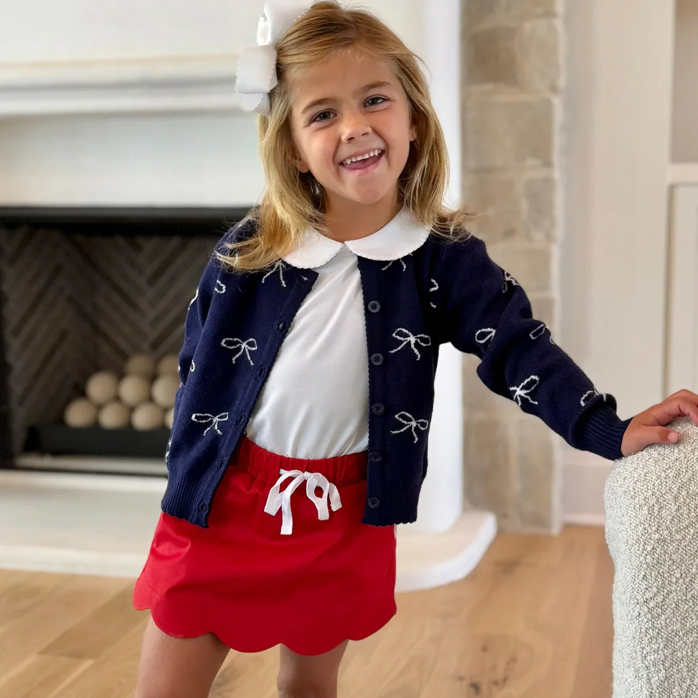 Navy Cardigan with Bow Pattern and Red Skort Navy Cardigan with Bow Pattern and Red Skort — Little Girl Outfits