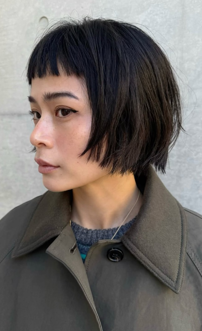 Green Coat and Grey Sweater with Black Bob and Micro Bangs — Short Bangs