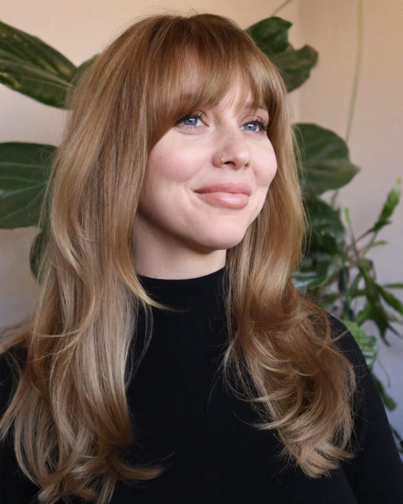 Birkin Bangs and a Classic Black Turtleneck Birkin Bangs and a Classic Black Turtleneck