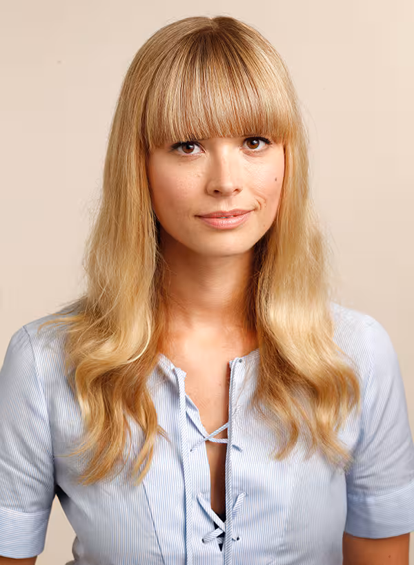 Preppy Polish: Pinstripe Shirt with Lace-Up Detail and Blunt Bangs
