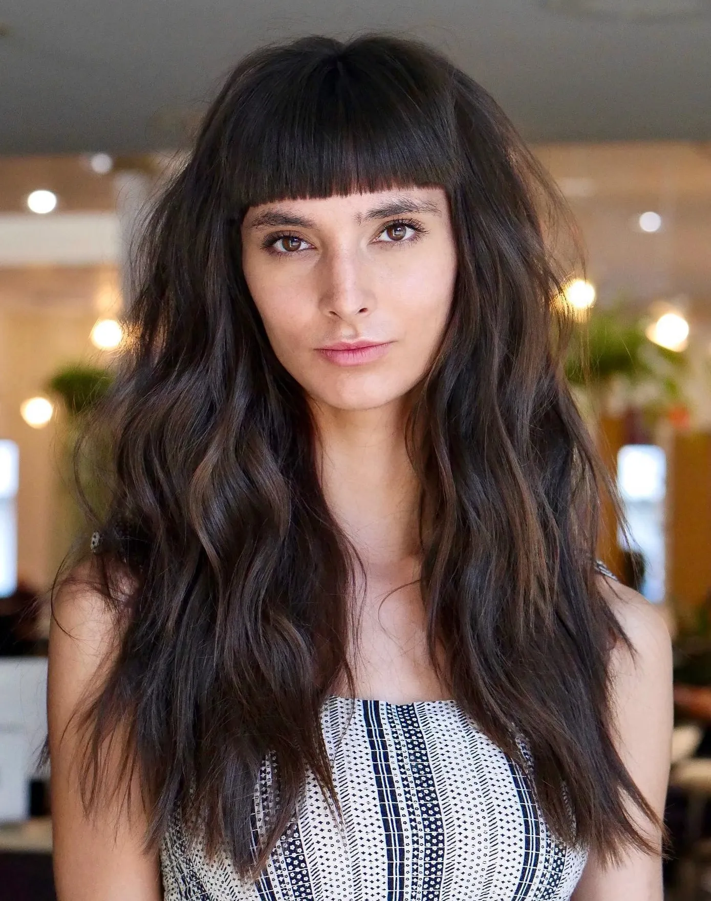 Bold Stripes, Wavy Hair: A Striking Casual Combination — Blunt Bangs