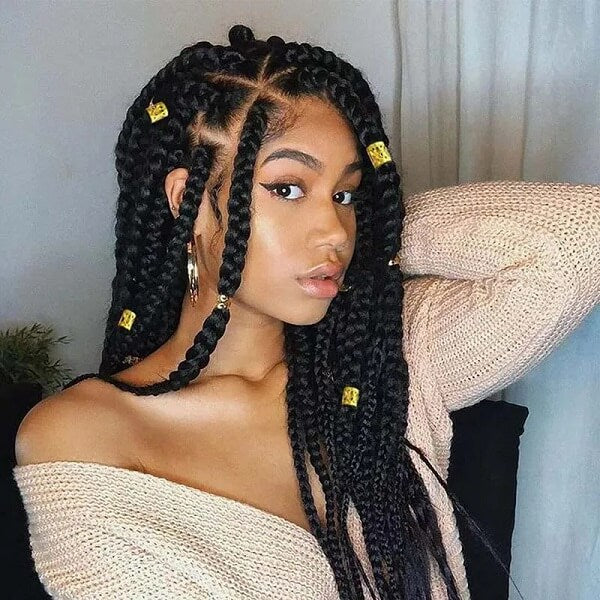 Black Jumbo Braids With Gold Cuffs