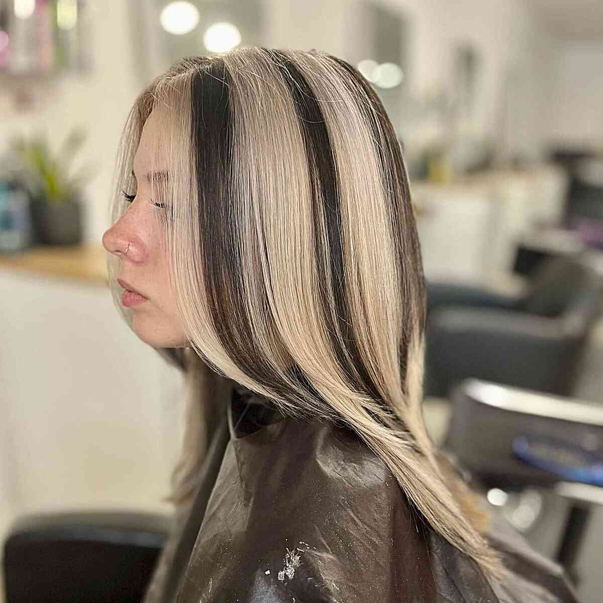 Collarbone Layers With Contrast Stripes Collarbone Layers With Contrast Stripes — Skunk Stripe Hair