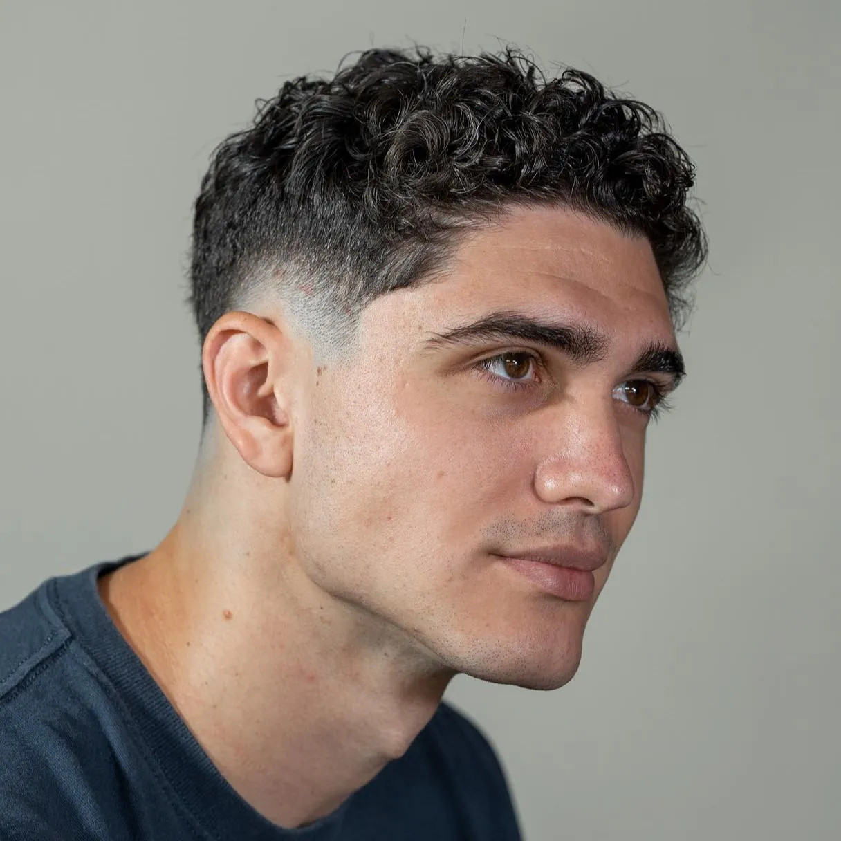 Thick Curls With Chin Length And Fade — Burst Fade