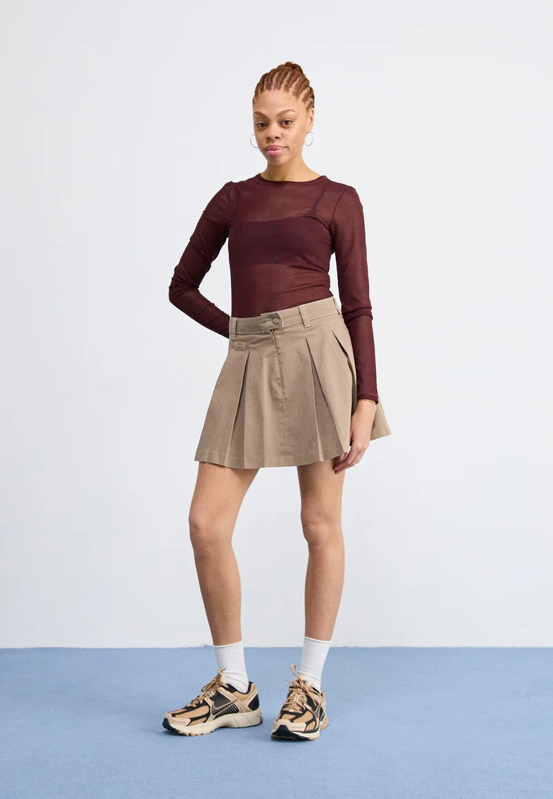 Athleisure Mini Skirt with Sheer Top — Nike Vomero Outfits