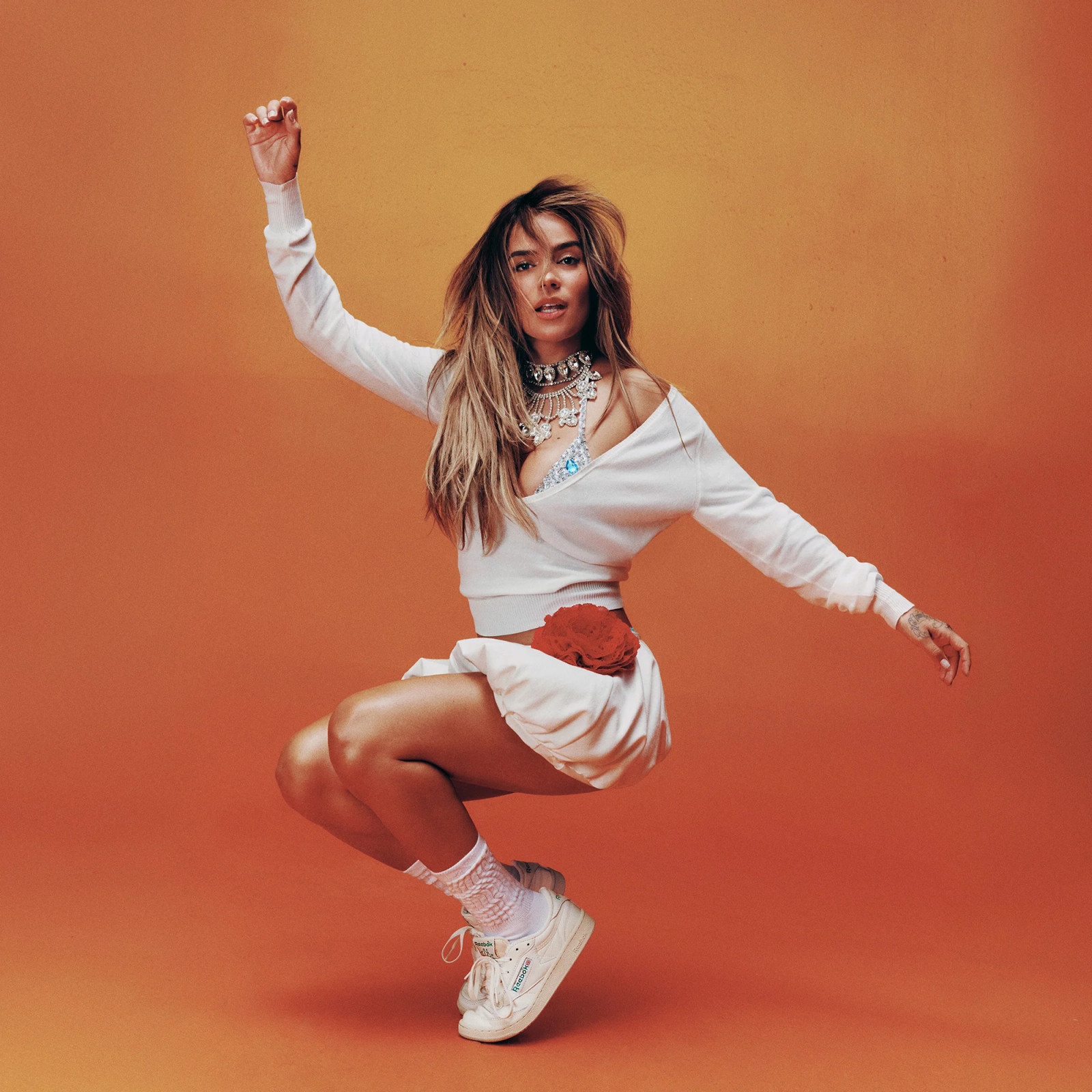 Athleisure Chic: Club C with Mini Skirt and Sweater — Reebok Club C Outfits