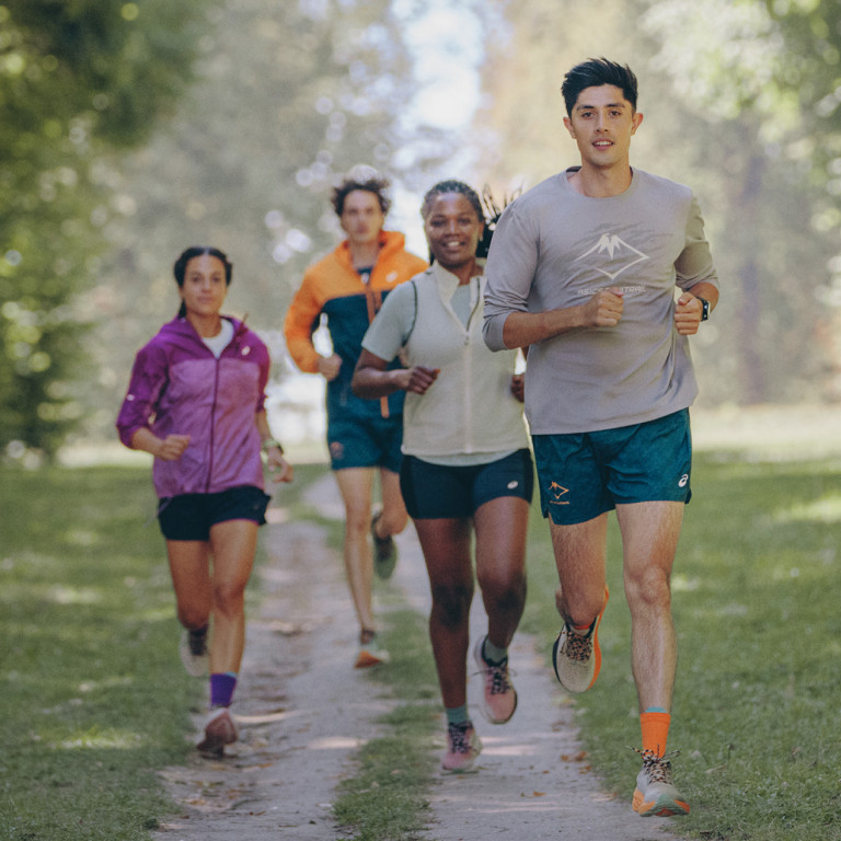 Teal Shorts and Orange Accents for Outdoor Running — Asics Outfits