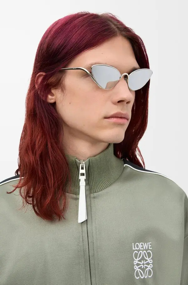 Streetwear Style: Sage Green Track Jacket with Silver Cat Eye Sunglasses Streetwear Style: Sage Green Track Jacket with Silver Cat Eye Sunglasses — Cat Eye Sunglasses Outfits
