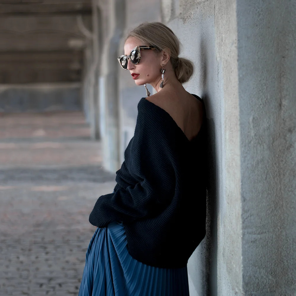 Chic Contrast: Black Knit Top with Flowing Blue Skirt and Cat Eye Sunglasses Chic Contrast: Black Knit Top with Flowing Blue Skirt and Cat Eye Sunglasses — Cat Eye Sunglasses Outfits